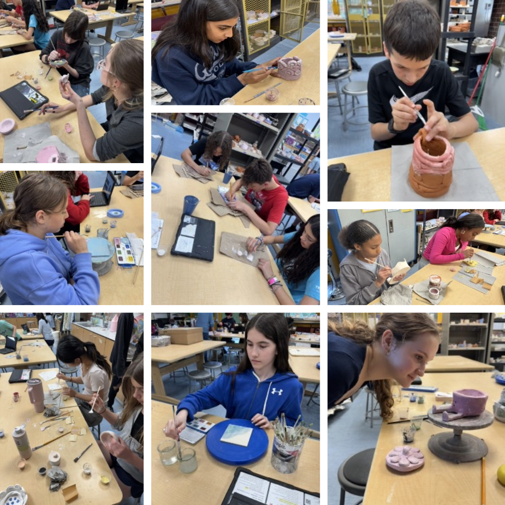 students working on pottery